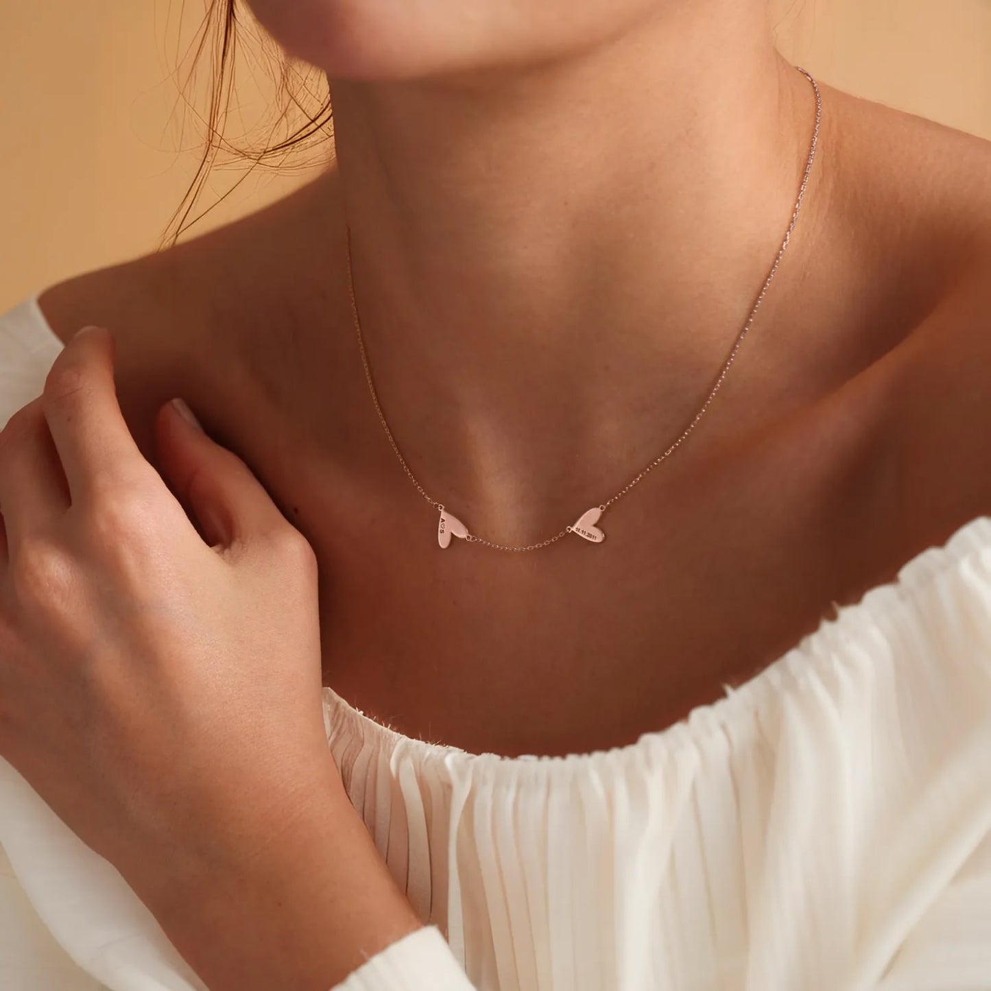 Collar personalizado con corazones grabados